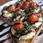 Bruschetta con Burrata, Pesto y Tomates Asados