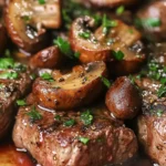 Bistec con Mantequilla de Ajo y Salsa de Champiñones y Vino Tinto